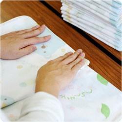 タオルの袋詰め